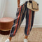 Pantaloni casual cu dungi multicolore pentru femei