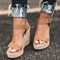 Sandales compensées en cuir beige pour femme