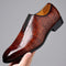 Chaussure habillée en cuir marron à motif crocodile pour homme