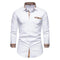 Chemise blanche à manches longues avec détails à carreaux