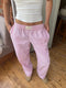 Pantaloni de relaxare roz cu dungi pentru femei